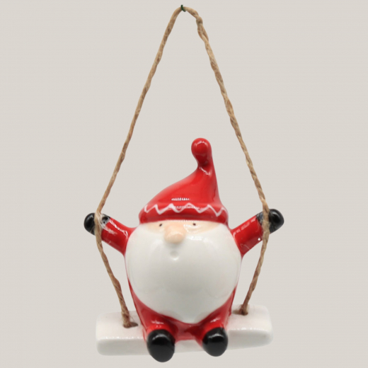 Santa Claus auf Schaukel – Keramik-Anhänger für Weihnachten (6,8 cm)